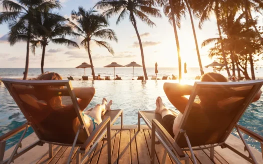 Koh Samui rental yields — couple relaxing at infinity pool villa Thailand